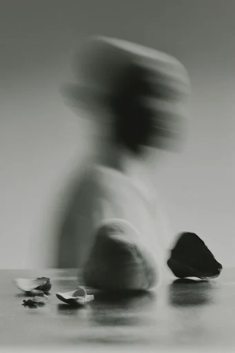 Kinetic Spectral Minimalism style reference image — ghostly kinetic trails