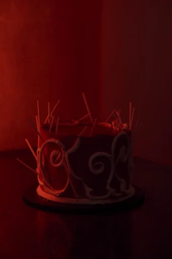 Cinematic Crimson Noir style reference image — theatrical red atmosphere