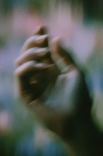 Ethereal Kinetic Impressionism style reference image — analog film grain