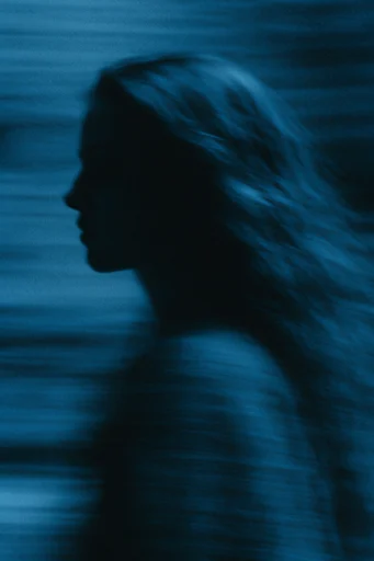 Spectral Cyan Motion style reference image — analog film grain