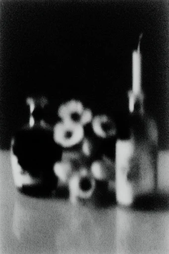 Gritty Chiaroscuro Noir style reference image — heavy film grain