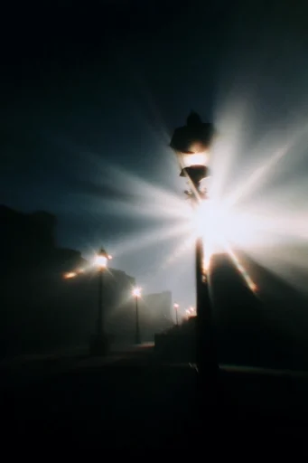 Cinematic Volumetric Noir style reference image — minimalist dark aesthetic