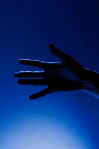 Cinematic Ultramarine Noir style reference image — high-contrast chiaroscuro
