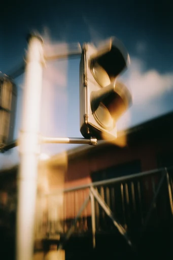 Cinematic Surreal Chiaroscuro style reference image — long exposure light trails