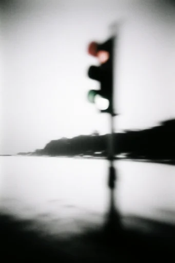 Ethereal Monochrome Noir style reference image — soft-focus diffusion