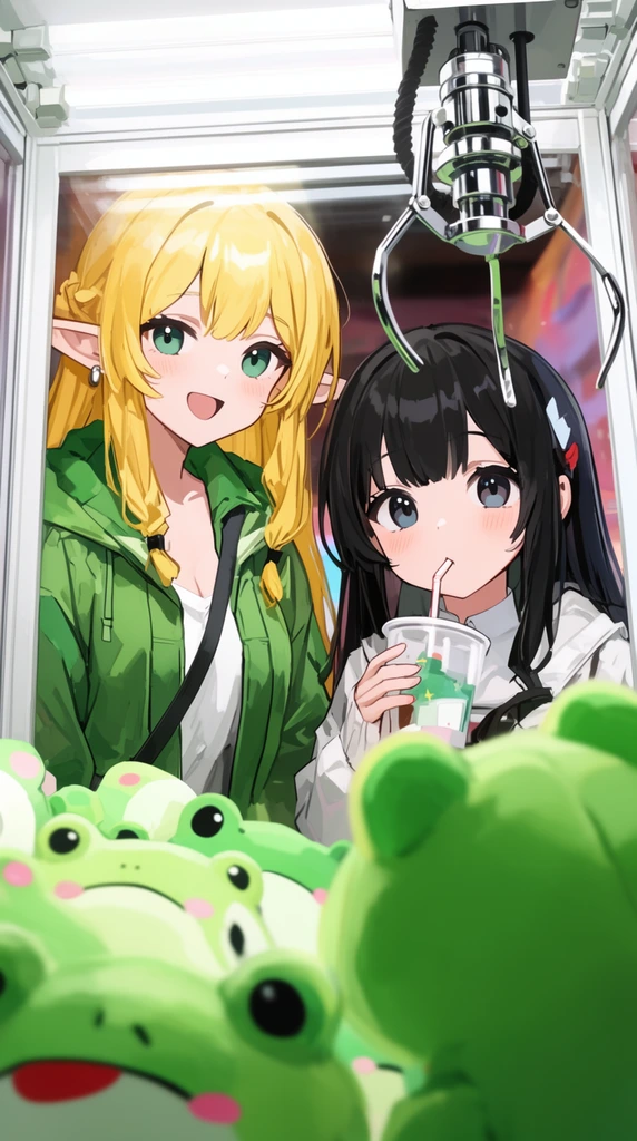 Two anime girls peer into a brightly lit claw machine from a low inside angle. A blonde elf in a green jacket smiles beside a black-haired girl drinking from a straw. A metal claw hovers above a green frog plushie in the foreground.
