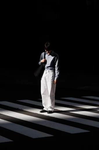 Cinematic Urban Chiaroscuro moodboard — generate AI images in this style