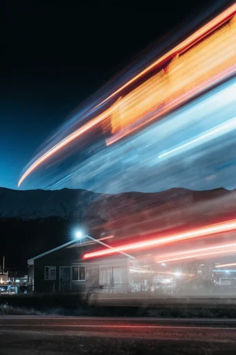 Kinetic Neon Surrealism style reference image — high contrast night photography