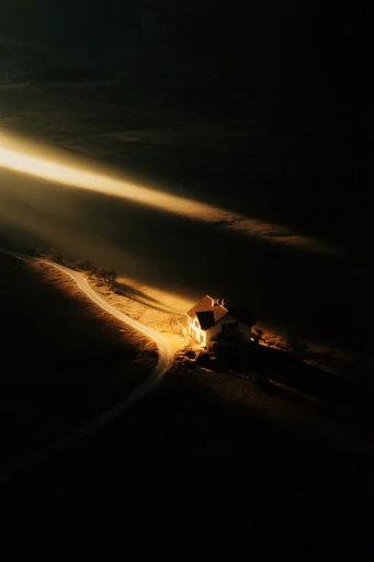 Chiaroscuro Pastoral Minimalism style reference image — high-angle aerial perspective