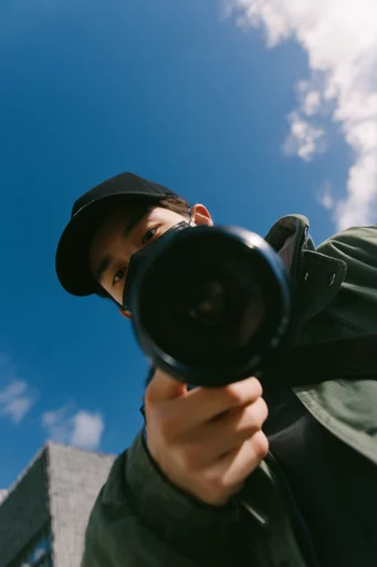 Cinematic Urban Low-Angle style reference image — streetwear fashion
