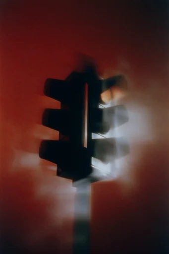 Crimson Cinematic Surrealism style reference image — ethereal bloom effect