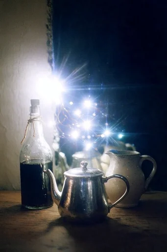 Electric Nocturnal Luminescence style reference image — anamorphic starburst flare