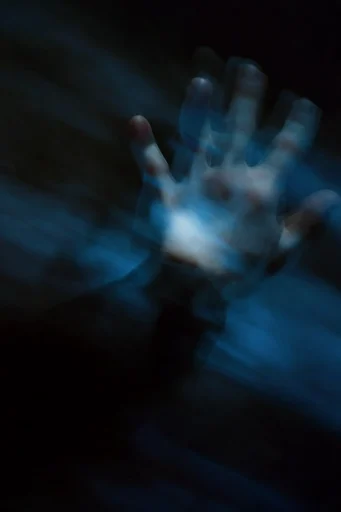 Spectral Cobalt Motion style reference image — low-key lighting