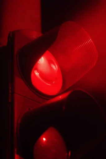 Cinematic Crimson Noir style reference image — chiaroscuro lighting