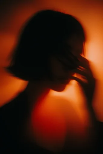 Luminous Amber Noir style reference image — dense warm fog