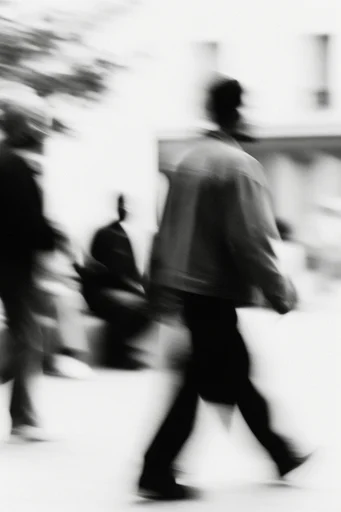 Kinetic Monochrome Noir style reference image — motion blur photography