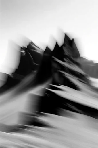 Kinetic Ghostly Monochrome style reference image — motion blur