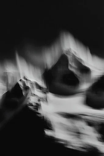 Kinetic Spectral Monochrome style reference image — high-contrast black and white photography
