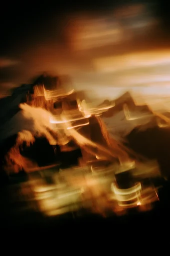 Kinetic Amber Dreamscape style reference image — intentional camera movement