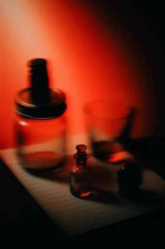 Crimson Kinetic Noir style reference image — crimson and black duotone