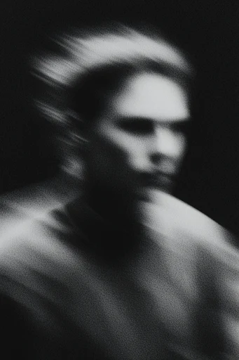 Monochrome Shadow Grain style reference image — motion blur silhouette