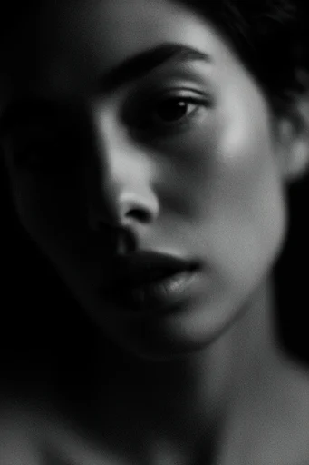Raw Cinematic Noir style reference image — heavy analog film grain