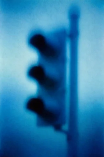 Ethereal Nocturnal Minimalism style reference image — heavy analog film grain