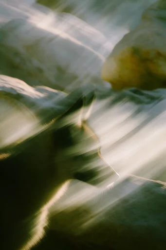 Ethereal Kinetic Impressionism style reference image — ethereal light streaks