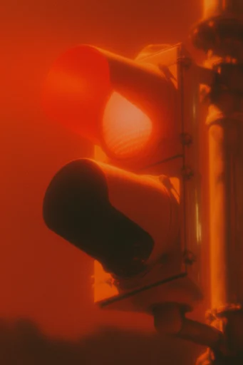 Cinematic Crimson Nocturne style reference image — heavy analog film grain