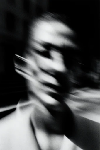 Cinematic Noir Chiaroscuro style reference image — high-contrast black and white photography
