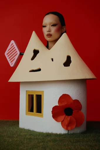 Bold Surrealist Editorial style reference image — avant-garde styling