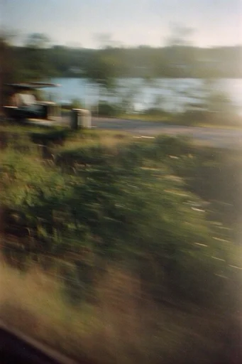 Kinetic Cinematic Nostalgia style reference image — analog film grain