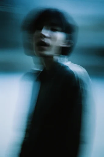 Ethereal Cyan Blur style reference image — heavy film grain