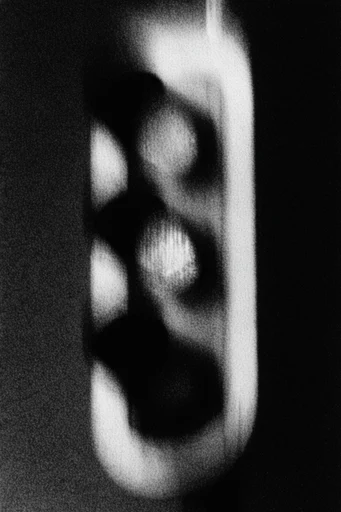 Gritty Monochromatic Noir style reference image — distressed print aesthetic