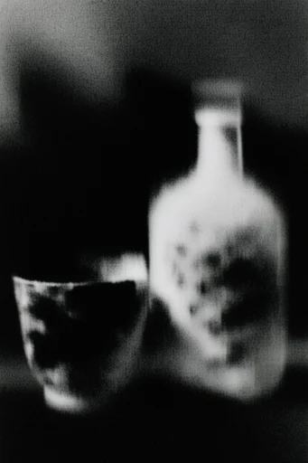 Ethereal Motion Noir style reference image — heavy analog film grain