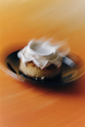 Kinetic Amber Nocturne style reference image — abstract light bokeh