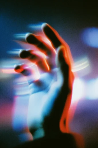 Cinematic Nocturnal Blur style reference image — long exposure light trails