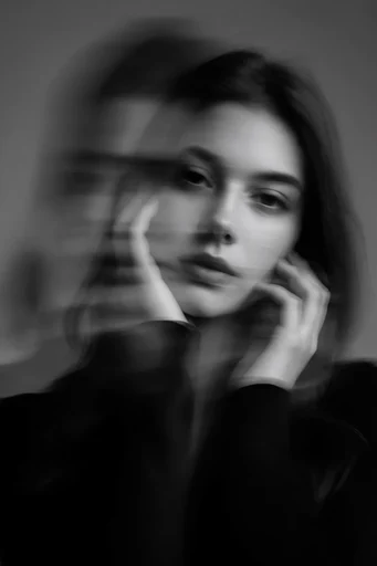 Ethereal Kinetic Noir style reference image — fragmented double exposure