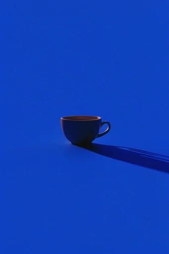 Cobalt Surreal Minimalism style reference image — saturated cobalt blue background