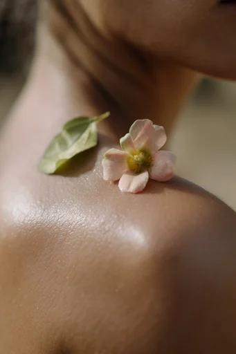 Intimate Macro Realism style reference image — raw skin texture