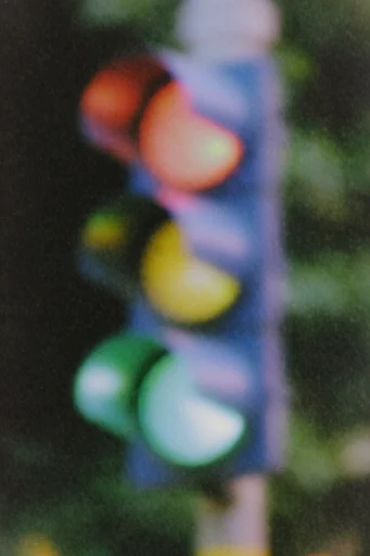Luminous Analog Glitch style reference image — heavy film grain