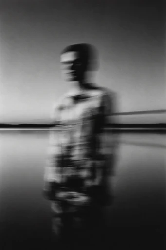 Kinetic Monochrome Distortion style reference image — motion blur portrait
