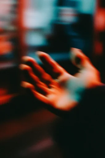 Cinematic Nocturnal Blur style reference image — heavy film grain