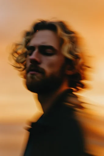 Amber Kinetic Nostalgia style reference image — amber sunset gradient