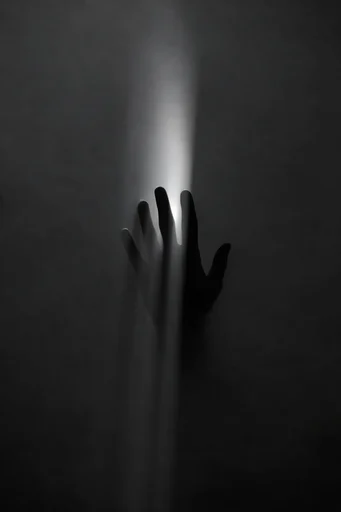 Monolithic Existential Minimalism style reference image — volumetric light shafts