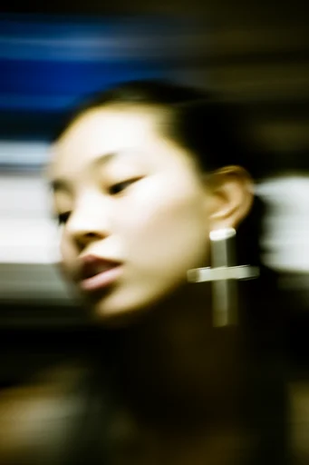 Kinetic Liquid Impressionism style reference image — abstract urban dreamscape