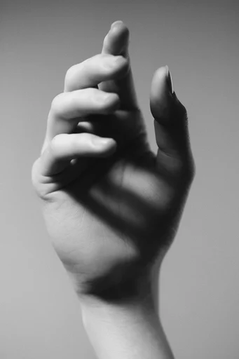 Timeless Monochrome Minimalism style reference image — chiaroscuro lighting