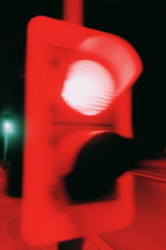 Gritty Photochemical Noir style reference image — spectral silhouette