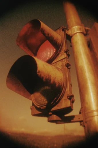 Nocturnal Analog Liminality style reference image — vintage surveillance aesthetic