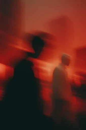 Crimson Kinetic Noir style reference image — high-contrast silhouette